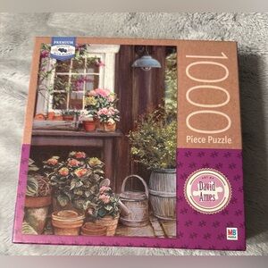 David Ames Potting Table Premium Blue Board 1000 Piece Jigsaw Puzzle 27”x 20"